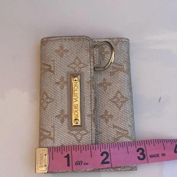 LOUIS VUITTON MINI LIN SHINE MONOGRAM WALLET - Picture 15 of 15